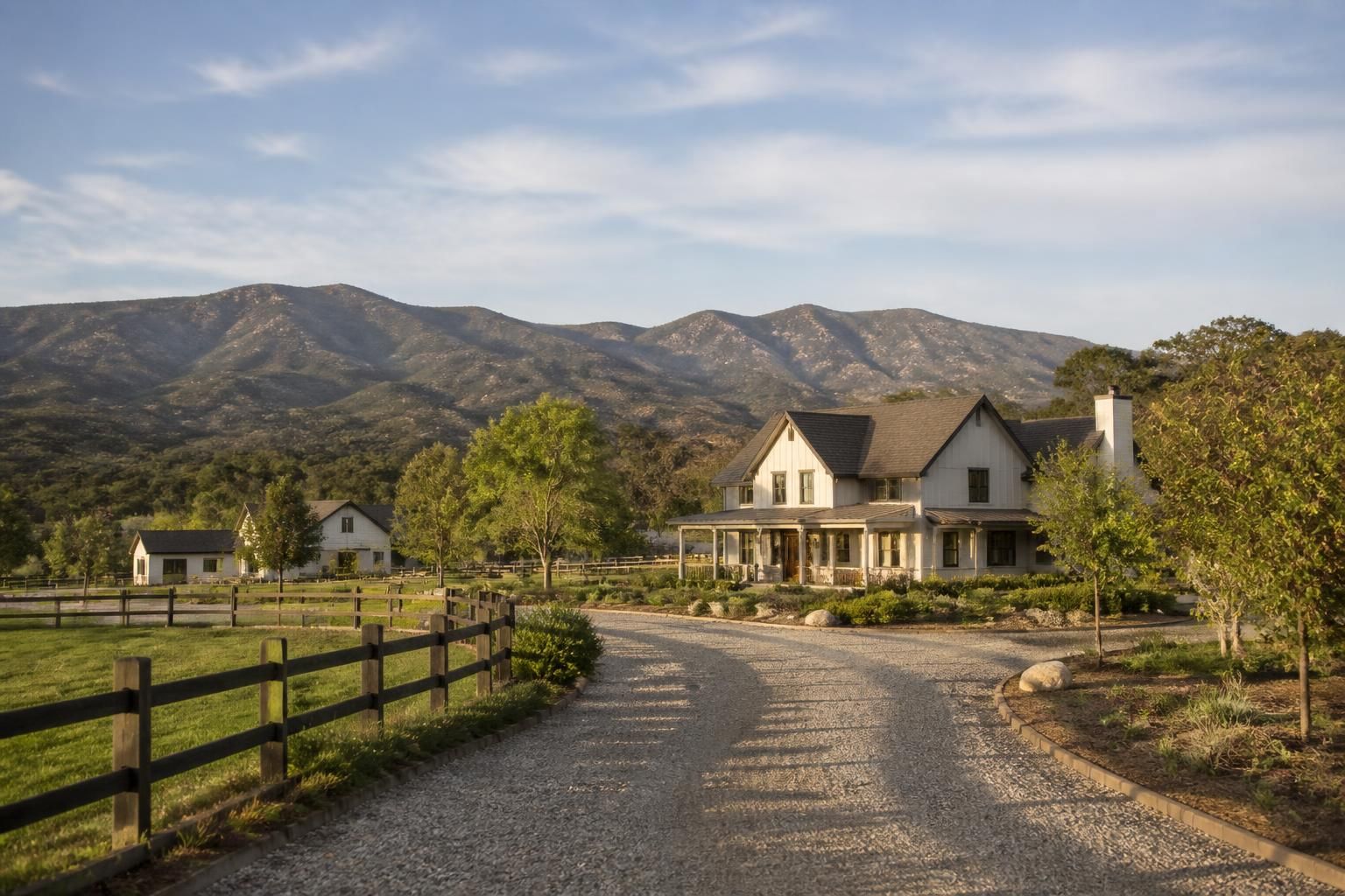 Rural Jamul residential scene with homes and natural hills.